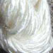 Bleach tussah silk roving spun into a lovely 2-ply yarn.