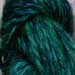 2-ply spindle-spun yarn that was overdyed with Kool-Aid.